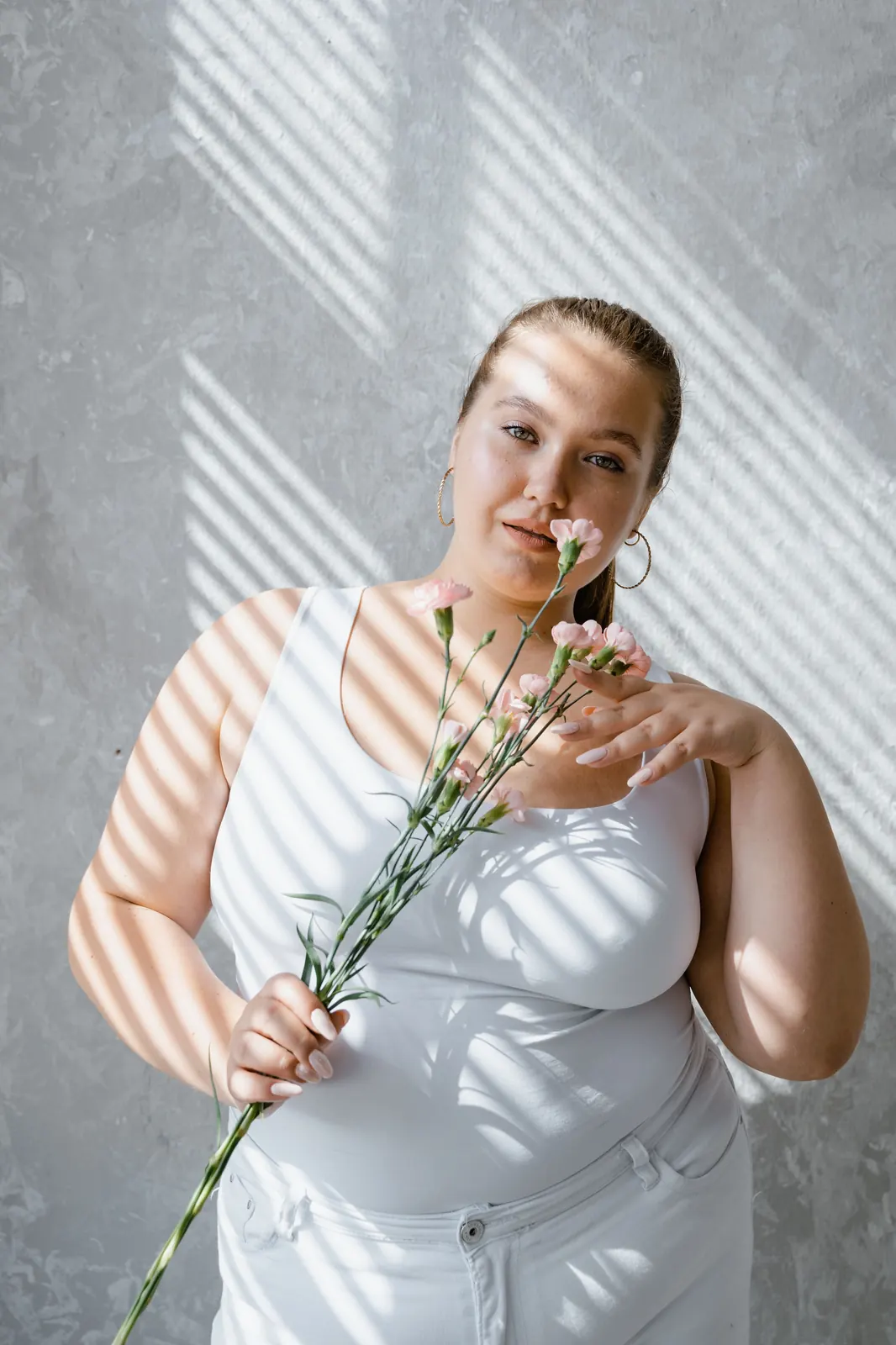 Illustrative stock photo of a curvy woman, styled for BBW Single's Toronto page. Not an actual member.